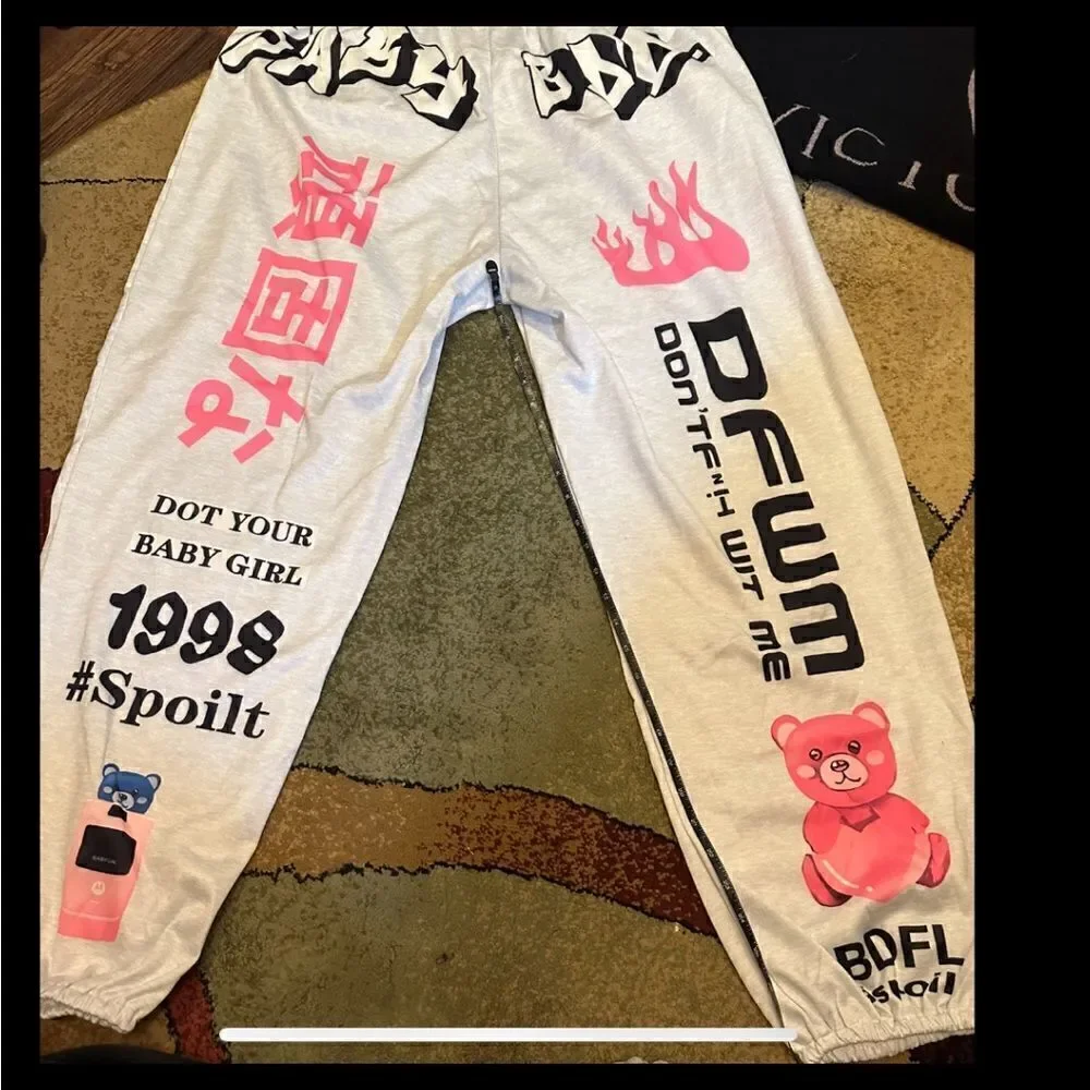 Y2K Printed joggers. Elastic at the ankle letter print with pockets. . Polyester